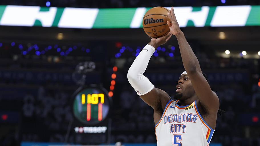 Thunder guard Luguentz Dort shoots against the Spurs.