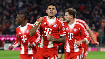 Bayern Munich players celebrating Luis Diaz's late goal against St. Pauli.