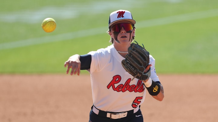 May 6, 2025; Athens, GA, USA; Ole Miss infielder Ashton Lansdell (5) throws to first base for an out during a game against Missouri at Jack Turner Softball Stadium.
