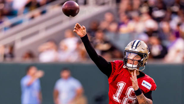 New Orleans Saints quarterback Spencer Rattler (18) passes during practice at Yulman Stadium 