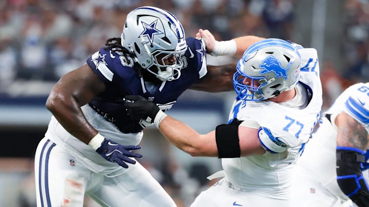 Oct 13, 2024; Arlington, Texas, USA; Dallas Cowboys defensive tackle Mazi Smith (58) and Detroit Lions center Frank Ragnow (77) battle during the second quarter at AT&T Stadium. Mandatory Credit: Kevin Jairaj-Imagn Images Oct 13, 2024; Arlington, Texas, USA; Dallas Cowboys defensive tackle Mazi Smith (58) and Detroit Lions center Frank Ragnow (77) battle during the second quarter at AT&T Stadium. Mandatory Credit: Kevin Jairaj-Imagn Images
