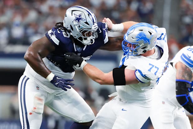 Dallas Cowboys defensive tackle Mazi Smith (58) and Detroit Lions center Frank Ragnow.