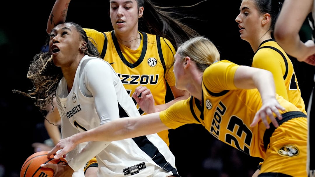 Vanderbilt guard Mikayla Blakes (1) drives to the basket as Missouri guard Abbey Schreacke (23) reaches in during the second half of an NCAA college basketball game at Memorial Gymnasium Thursday, Jan. 8, 2026, in Nashville, Tenn. Vanderbilt won 99-68.