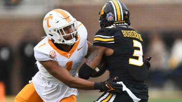 Tennessee defensive back Gabe Jeudy-Lally (1) tackled Missouri wide receiver Luther Burden III (3) during an NCAA college football game on Saturday, November 11, 2023 in Columbia, MO.