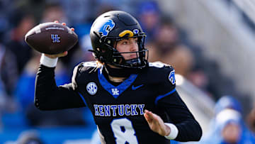 Nov 30, 2024; Lexington, Kentucky, USA; Kentucky Wildcats quarterback Cutter Boley (8) throws a pass during the first quarter against the Louisville Cardinals at Kroger Field. Mandatory Credit: Jordan Prather-Imagn Images