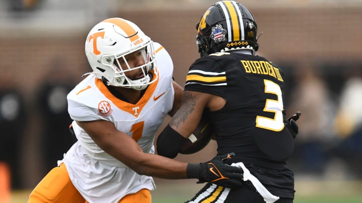 Tennessee defensive back Gabe Jeudy-Lally (1) tackled Missouri wide receiver Luther Burden III (3) during an NCAA college football game on Saturday, November 11, 2023 in Columbia, MO.