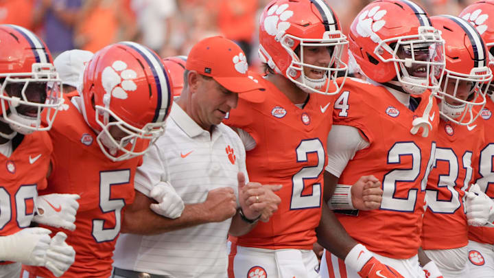 The Clemson Tigers are currently in a weather delay and are down to the Troy Trojans by a score of 7-0 with under five minutes played in the game. 