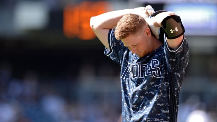 Sep 8, 2019; San Diego, CA, USA; San Diego Padres starting pitcher Eric Lauer (46) reacts after hitting a fly ball to the outfield wall against the Colorado Rockies during the fourth inning at Petco Park. Mandatory Credit: Orlando Ramirez-USA TODAY Sports