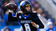 Nov 30, 2024; Lexington, Kentucky, USA; Kentucky Wildcats quarterback Cutter Boley (8) throws a pass during the first quarter against the Louisville Cardinals at Kroger Field. Mandatory Credit: Jordan Prather-Imagn Images