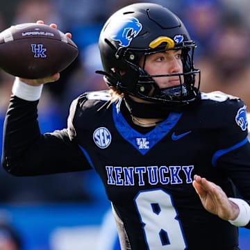 Nov 30, 2024; Lexington, Kentucky, USA; Kentucky Wildcats quarterback Cutter Boley (8) throws a pass during the first quarter against the Louisville Cardinals at Kroger Field. Mandatory Credit: Jordan Prather-Imagn Images