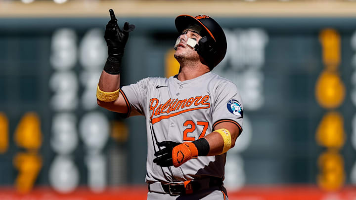 Sep 1, 2024; Denver, Colorado, USA; Baltimore Orioles catcher James McCann (27) reacts from second on a double in the ninth inning against the Colorado Rockies at Coors Field. 