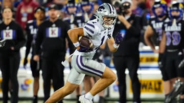 Nov 18, 2023; Lawrence, Kansas, USA; Kansas State Wildcats wide receiver Jayce Brown (1) runs with the ball during the second half against the Kansas Jayhawks at David Booth Kansas Memorial Stadium. Mandatory Credit: Jay Biggerstaff-USA TODAY Sports