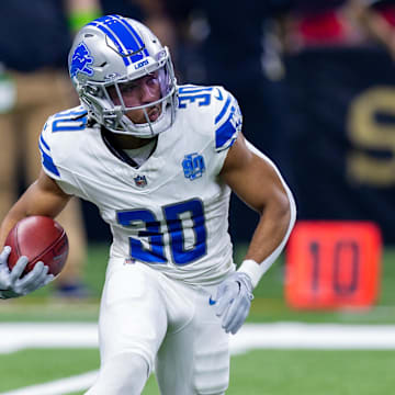 Detroit Lions cornerback Khalil Dorsey (30) runs back the kickoff against the New Orleans Saints