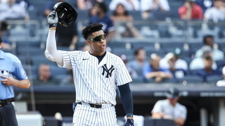 Aug 24, 2024; Bronx, New York, USA;  New York Yankees right fielder Juan Soto (22) tosses his helmet after striking out in the seventh inning against the Colorado Rockies at Yankee Stadium. Mandatory Credit: Wendell Cruz-USA TODAY Sports