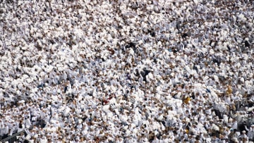 Penn State fans cheer on the Nittany Lions before playing Iowa in a White Out football game at Beaver Stadium