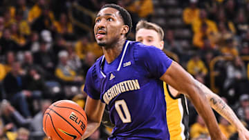Feb 22, 2025; Iowa City, Iowa, USA; Washington Huskies guard Mekhi Mason (0) goes to the basket against the Iowa Hawkeyes during the first half at Carver-Hawkeye Arena. Mandatory Credit: Jeffrey Becker-Imagn Images