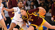 Feb 2, 2025; Los Angeles, California, USA; Minnesota Golden Gophers guard Amaya Battle (3) tries to dribble past UCLA Bruins guard Londynn Jones (3) during the third quarter at Pauley Pavilion presented by Wescom. Mandatory Credit: Robert Hanashiro-Imagn Images