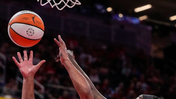 Alyssa Thomas fighting for a rebound