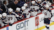 Oct 4, 2025; Washington, District of Columbia, USA; Columbus Blue Jackets right wing Mathieu Olivier (24) celebrates with teammates after scoring a goal against the Washington Capitals in the third period at Capital One Arena. Mandatory Credit: Geoff Burke-Imagn Images