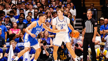 Oct 4, 2024; Durham, NC, USA; Duke Blue Devils guard Cooper Flagg (2) dribbles the ball against forward Mason Gillis (18) with the ball during Countdown to Craziness at Cameron Indoor Stadium. Mandatory Credit: Jaylynn Nash-Imagn Images