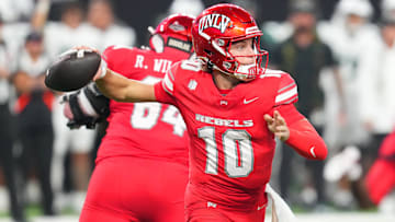 UNLV Rebels quarterback Anthony Colandrea (10) looks to throw against the Hawaii Rainbow Warriors during the second quarter at Allegiant Stadium. Mandatory Credit: Stephen R. Sylvanie-Imagn Images