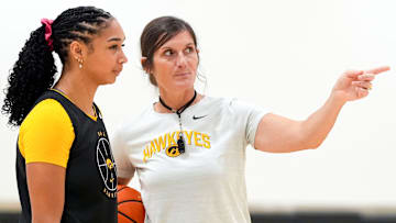Iowa forward Hannah Stuelke talks to assistant coach Randi Henderson during a women’s basketball practice July 22, 2025 at Carver-Hawkeye Arena in Iowa City, Iowa.