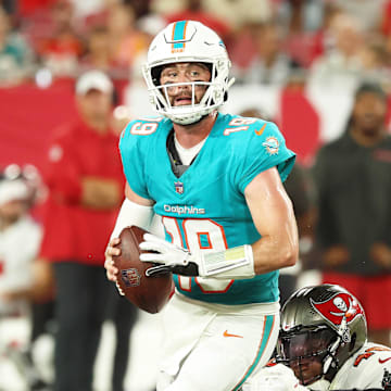 Aug 23, 2024; Tampa, Florida, USA;  Tampa Bay Buccaneers linebacker Antonio Grier Jr. (48) pressures Miami Dolphins quarterback Skylar Thompson (19) during the second half at Raymond James Stadium. Mandatory Credit: Kim Klement Neitzel-Imagn Images