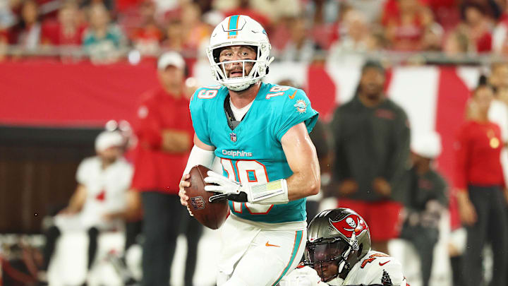 Aug 23, 2024; Tampa, Florida, USA;  Tampa Bay Buccaneers linebacker Antonio Grier Jr. (48) pressures Miami Dolphins quarterback Skylar Thompson (19) during the second half at Raymond James Stadium. Mandatory Credit: Kim Klement Neitzel-Imagn Images