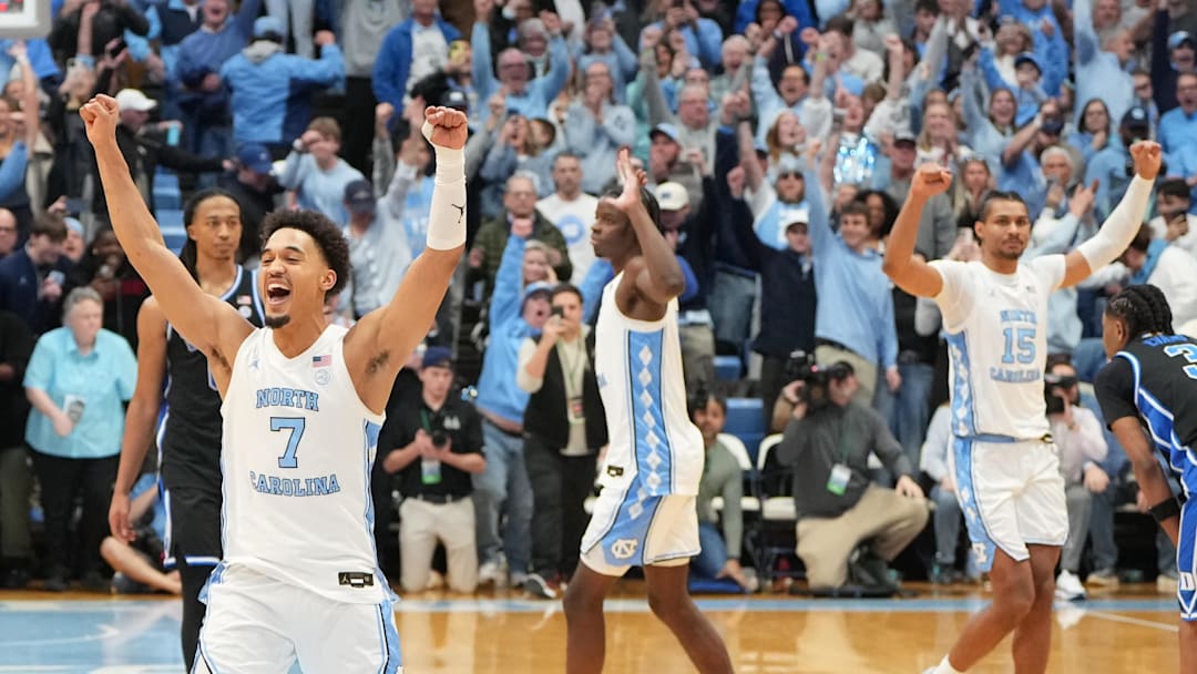 Feb 7, 2026; Chapel Hill, North Carolina, USA;  North Carolina Tar Heels guard Seth Trimble (7) and teammate celebrate after defeating Duke at Dean E. Smith Center. Mandatory Credit: Bob Donnan-Imagn Images