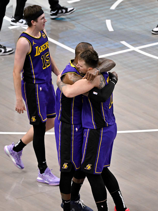 Los Angeles Lakers forward LeBron James (23) and guard Luka Doncic