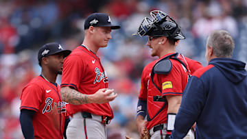 May 29, 2025; Philadelphia, Pennsylvania, USA; Atlanta Braves pitcher AJ Smith-Shawver (32) talks with catcher Sean Murphy (12) before leaving the game during the third inning against the Philadelphia Phillies at Citizens Bank Park. Mandatory Credit: Bill Streicher-Imagn Images