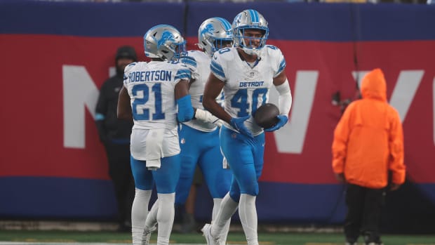 Brandon Joseph celebrates an interception in the Lions preseason opener against the New York Giants.