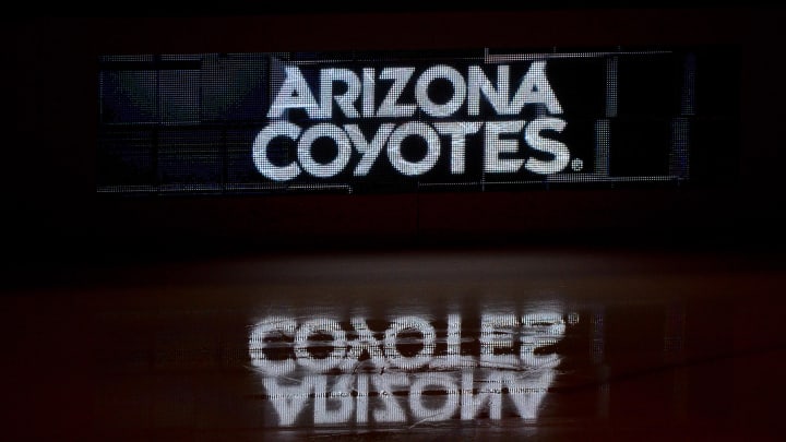 Oct 14, 2017; Glendale, AZ, USA; The Arizona Coyotes logo is reflected on the ice prior to the game