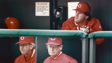 Reds' coach Tommy Helms, coach Scott Breeden, and manager Pete Rose.