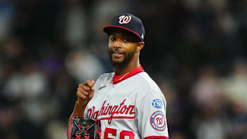 Apr 8, 2023; Denver, Colorado, USA; Washington Nationals relief pitcher Carl Edwards Jr. (58) reacts in the ninth inning against the Colorado Rockies at Coors Field. Mandatory Credit: Ron Chenoy-Imagn Images