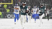 Jan 19, 2025; Philadelphia, Pennsylvania, USA; Philadelphia Eagles running back Saquon Barkley (26) carries the ball to score a touchdown against the Los Angeles Rams in the second half in a 2025 NFC divisional round game at Lincoln Financial Field. Mandatory Credit: Eric Hartline-Imagn Images