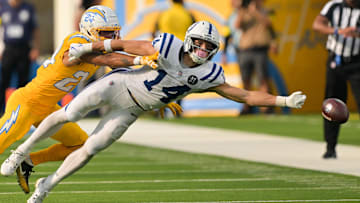 Oct 19, 2025; Inglewood, California, USA; Los Angeles Chargers defensive back Elijah Molden (2) breaks up a pass for Indianapolis Colts wide receiver Alec Pierce (14) in the second half at SoFi Stadium. Mandatory Credit: Jayne Kamin-Oncea-Imagn Images