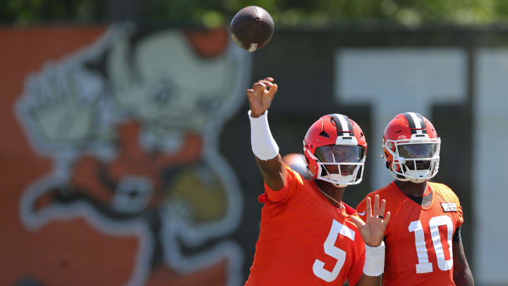 Browns quarterback Jameis Winston throws as quarterback Tyler Huntley watches during minicamp, Wednesday, June 12, 2024, in Berea.