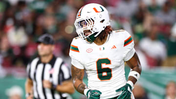 Sep 21, 2024; Tampa, Florida, USA; Miami Hurricanes running back Damien Martinez (6) reacts after scoring a touchdown against the South Florida Bulls in the third quarter at Raymond James Stadium.