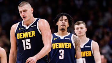 Nikola Jokic, Julian Strawther and guard Christian Braun
