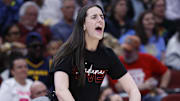 Indiana Fever guard Caitlin Clark reacts to the team making a basket.