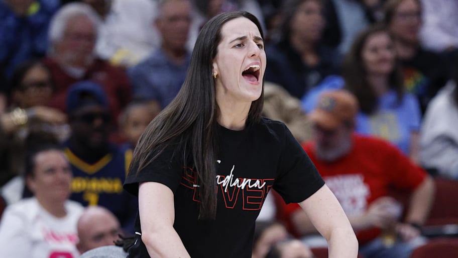 Indiana Fever guard Caitlin Clark reacts to the team making a basket. | Kamil Krzaczynski-Imagn Images