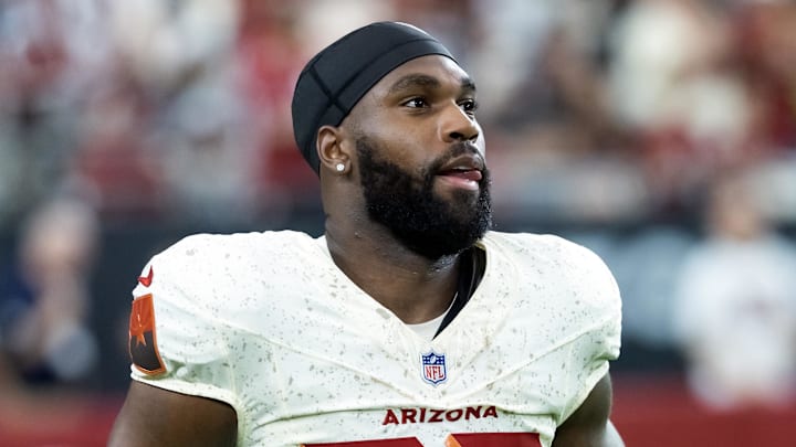 Sep 25, 2025; Glendale, Arizona, USA; Arizona Cardinals running back Bam Knight (20) against the Seattle Seahawks at State Farm Stadium. Mandatory Credit: Mark J. Rebilas-Imagn Images