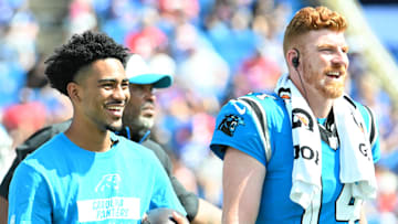 Bryce Young and Andy Dalton