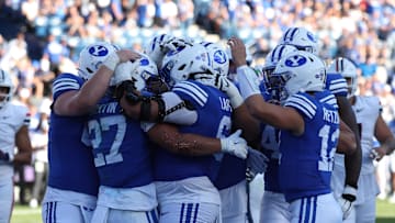 The entire BYU offense celebrates with LJ Martin in the endzone against Arizona.