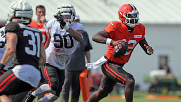 Cleveland Browns quarterback Shedeur Sanders runs for a short gain during NFL training camp ahead of the 2025 season