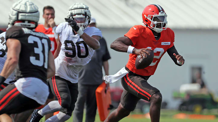 Cleveland Browns quarterback Shedeur Sanders runs for a short gain during NFL training camp ahead of the 2025 season