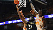 Feb 15, 2025; Knoxville, Tennessee, USA; Vanderbilt Commodores forward Jaylen Carey (22) goes to the basket against the Tennessee Volunteers during the first half at Thompson-Boling Arena at Food City Center. Mandatory Credit: Randy Sartin-Imagn Images