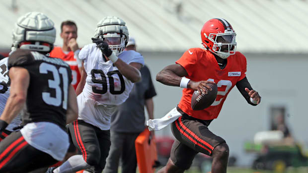 Cleveland Browns quarterback Shedeur Sanders (12) runs for a short gain during NFL training camp