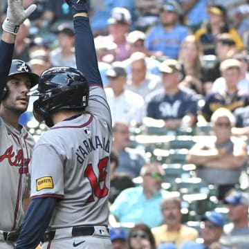 Matt Olson and Travis d'Arnaud powered the Atlanta Braves to a 6-2 win over the Milwaukee Brewers on Wednesday.